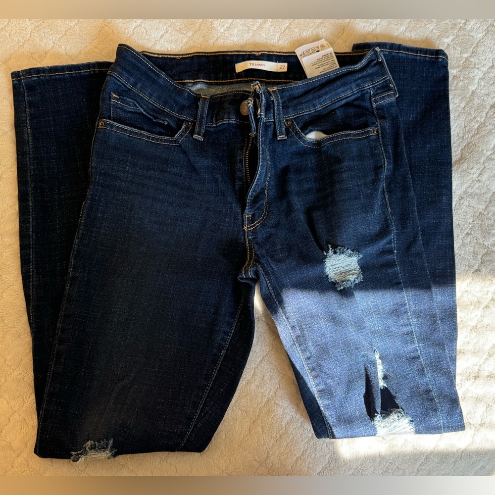 Levi’s 711 Skinny jeans; Size: 27; Rips at thighs and knees; Never worn